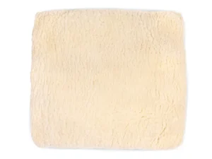 Square-shaped natural sheepskin wheelchair cushion, shown on a white background.