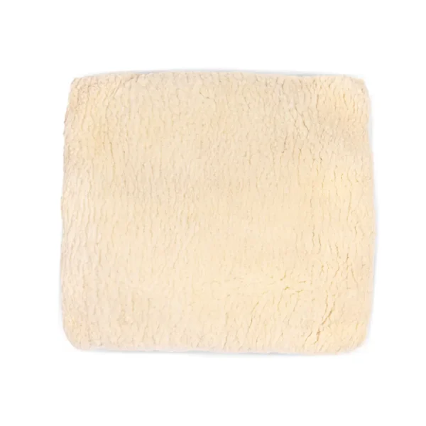 Square-shaped natural sheepskin wheelchair cushion, shown on a white background.