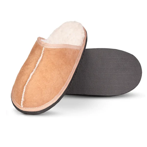 Top and sole view of Kalahari Classic sheepskin slipper, showcasing the stitched suede exterior, plush fleece lining, and durable black textured outsole.