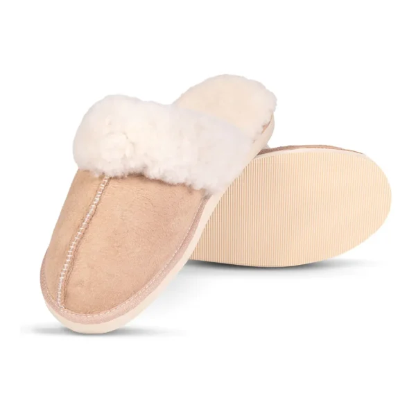 Angled view of a Namaqua Premium sheepskin slipper, showcasing the soft suede upper and durable outsole.