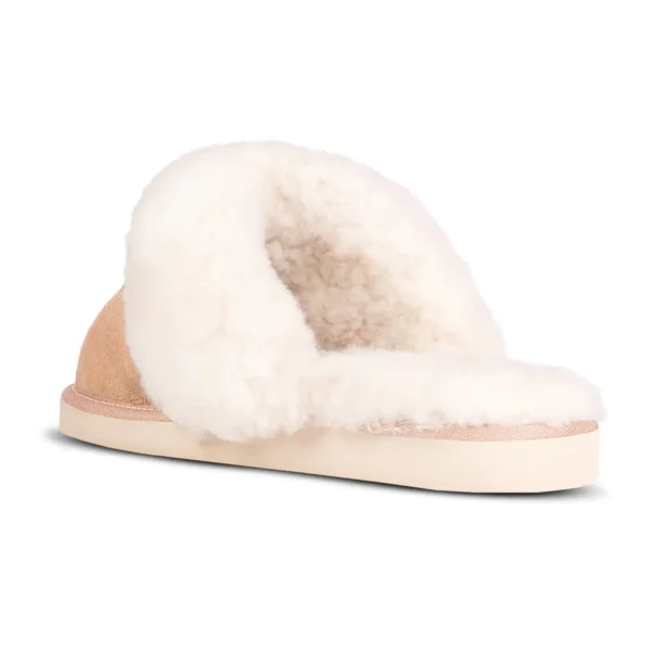 Side view of a Namaqua Premium sheepskin slipper, featuring a soft suede exterior and plush wool lining.