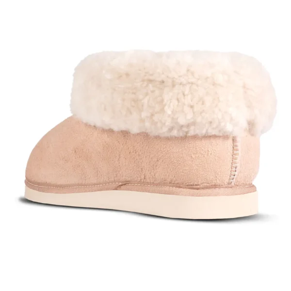 Side profile view of the Karoo Premium sheepskin slipper with a soft wool cuff and durable sole.